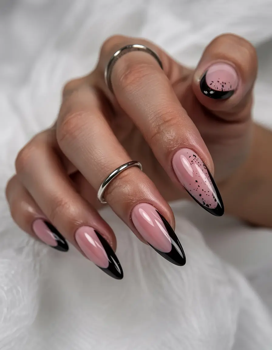 june nails color ideas 2025 Edgy Elegance in Black French with Speckled Details