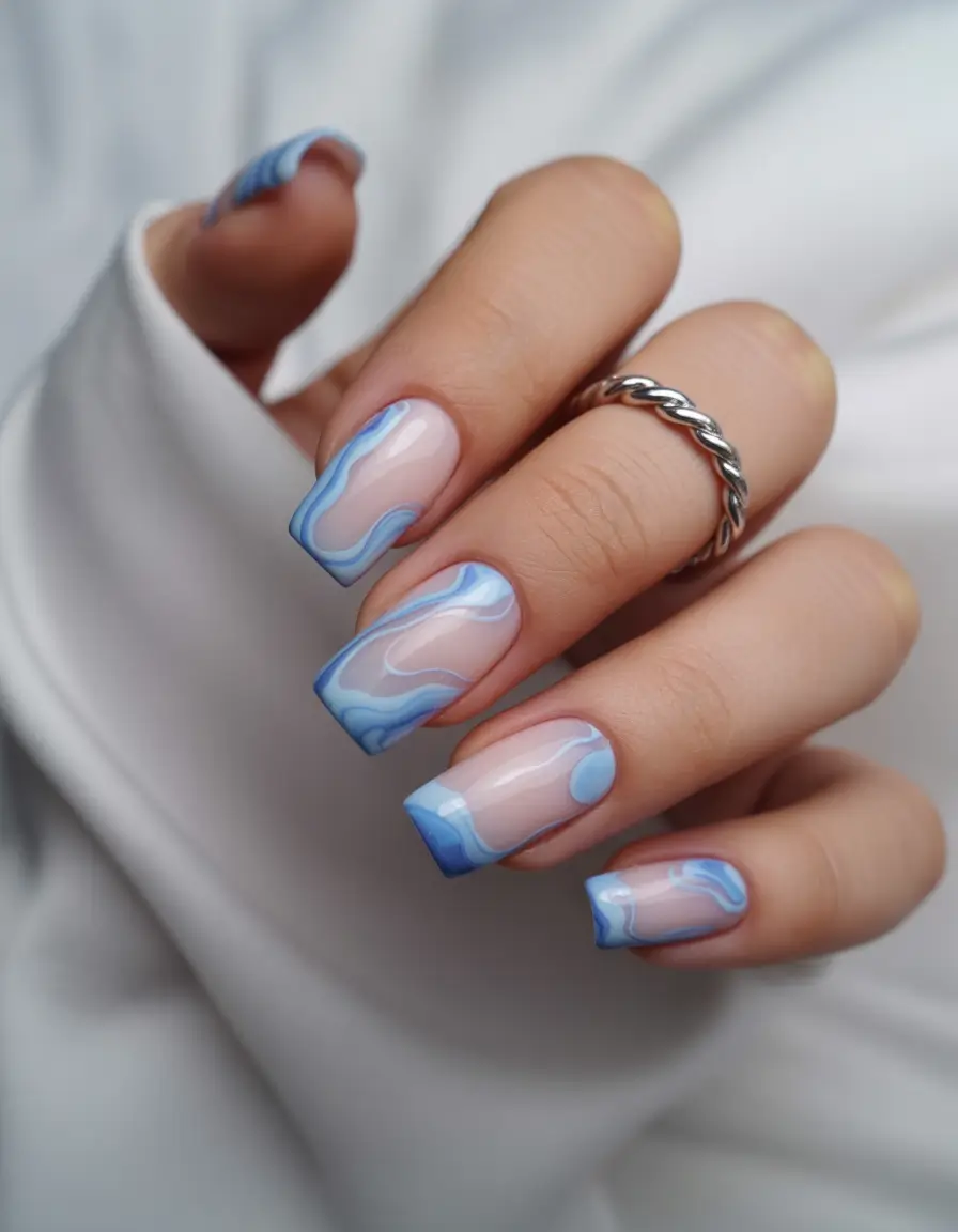 simple summer nails ideas 2025 Blue Marble Swirl for Coastal Cool