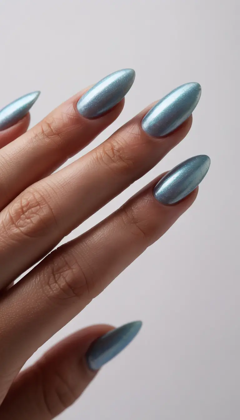 summer blue nails ideas 2025 Metallic Sky on Almond Tips