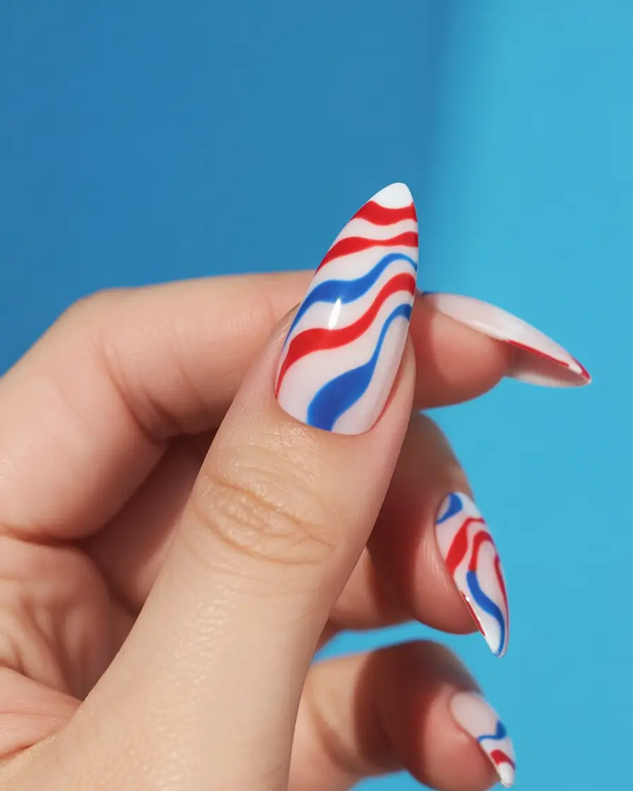 july nails color ideas 2025 Star-Spangled Swirls with a Retro Twist