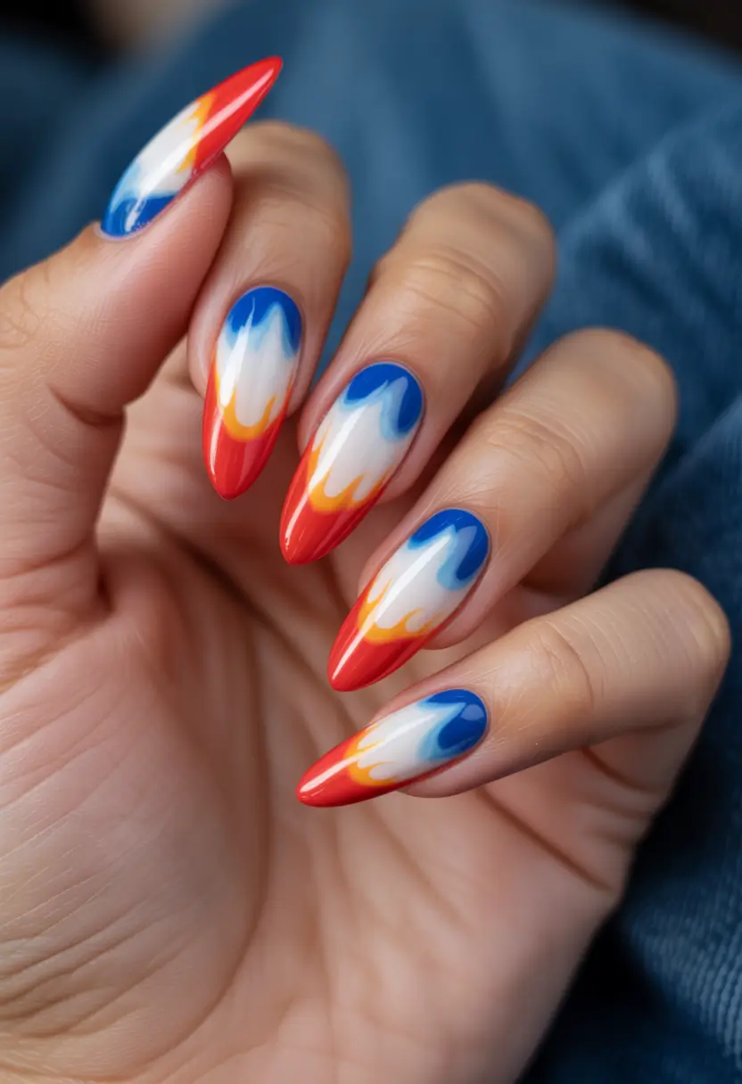 july nails ideas 2025 Red-Hot Flames with an Ombre Burn