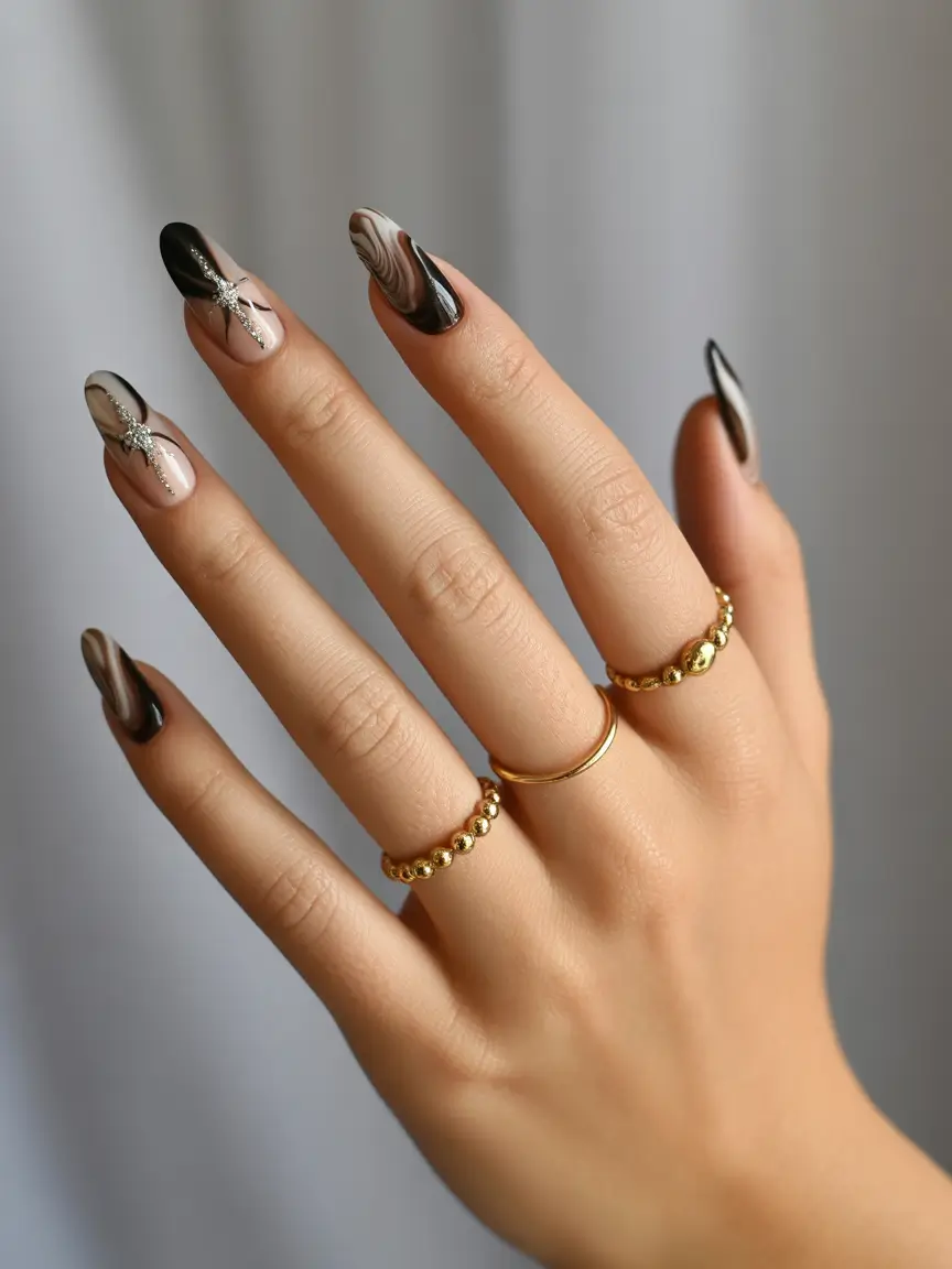 september-nails-design-fall-trends-for-2025 Glossy Marble & Starburst Accents