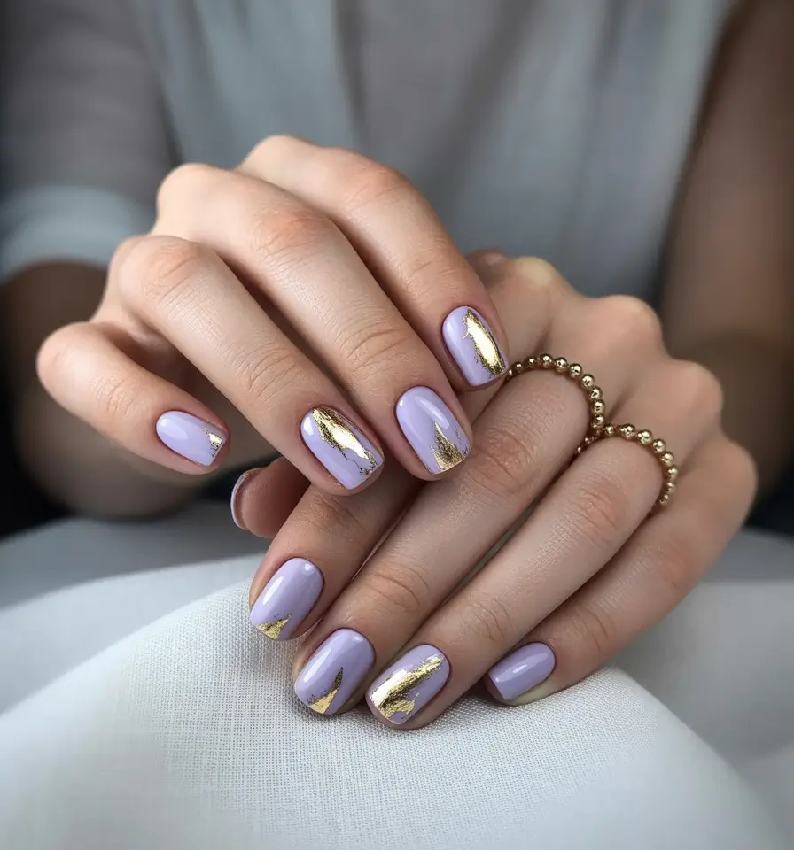 Fall-2025-Manicure-Trends-Lilac-Luxe-with-Gold-Foil-Accents