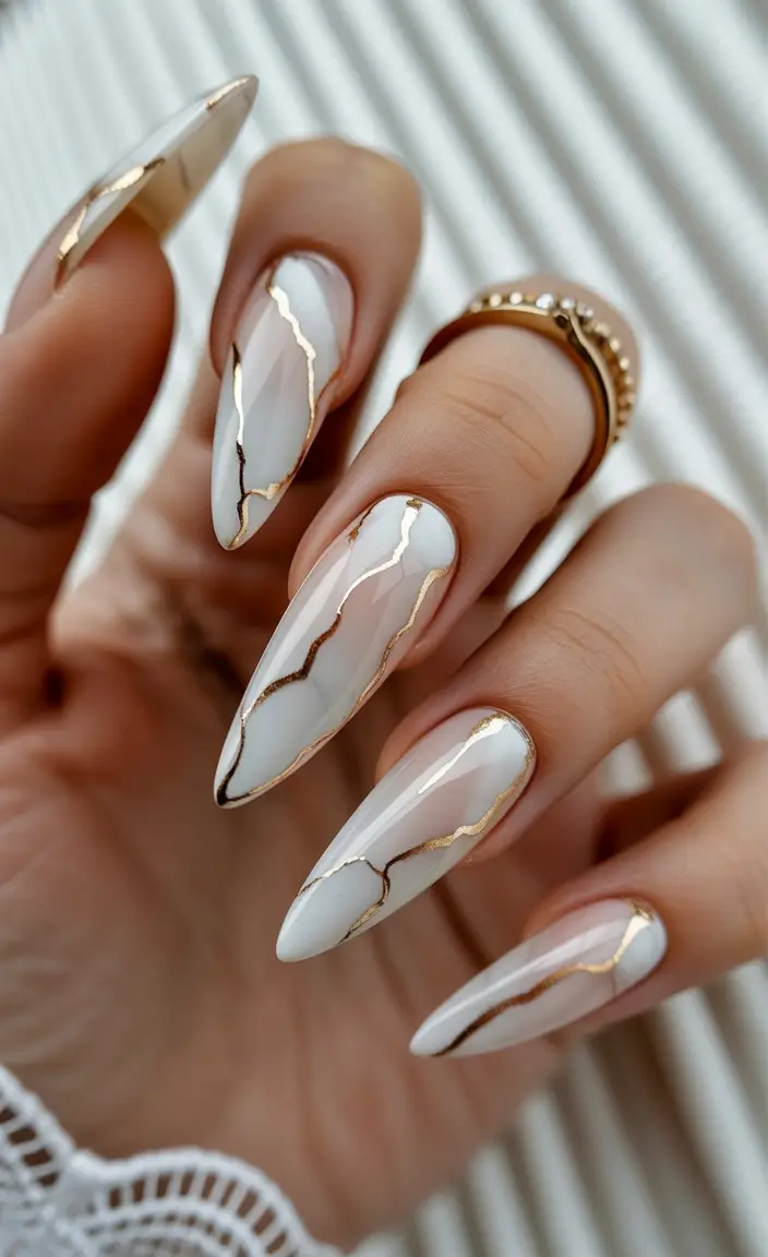 Fall 2025 Manicure Trends White Marble with Golden Veins