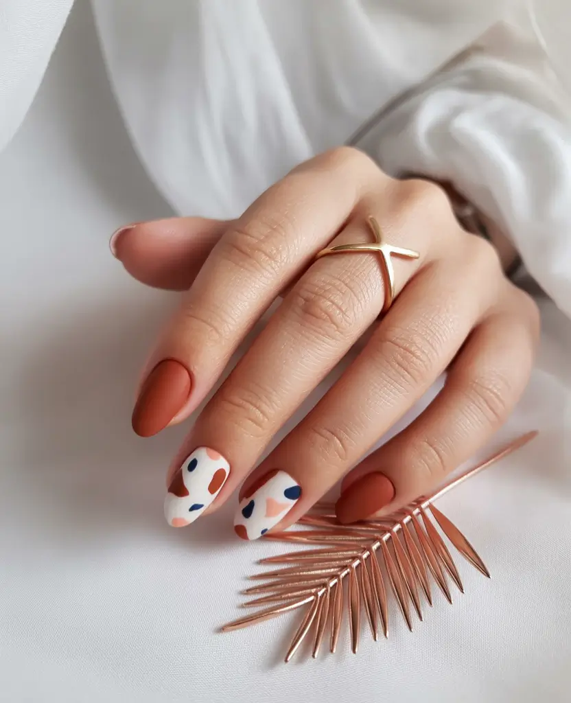minimalist fall nails Terrazzo-Inspired with Rust Accents