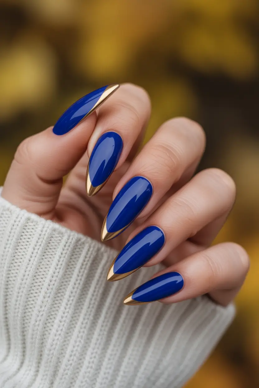 Navy Blue Nail Ideas for Fall 2025 Glossy Almond Navy with Gold Accents