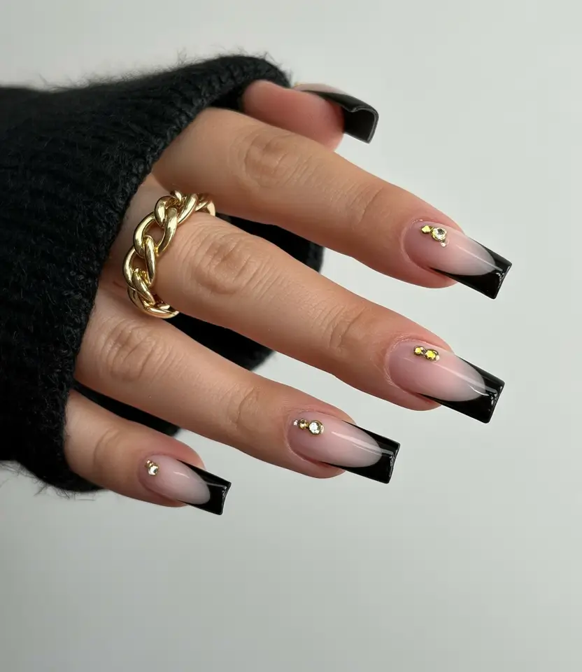 Stylish Fall French Tip Nails 2025 - Black-Capped French with Petite Gold Studs
