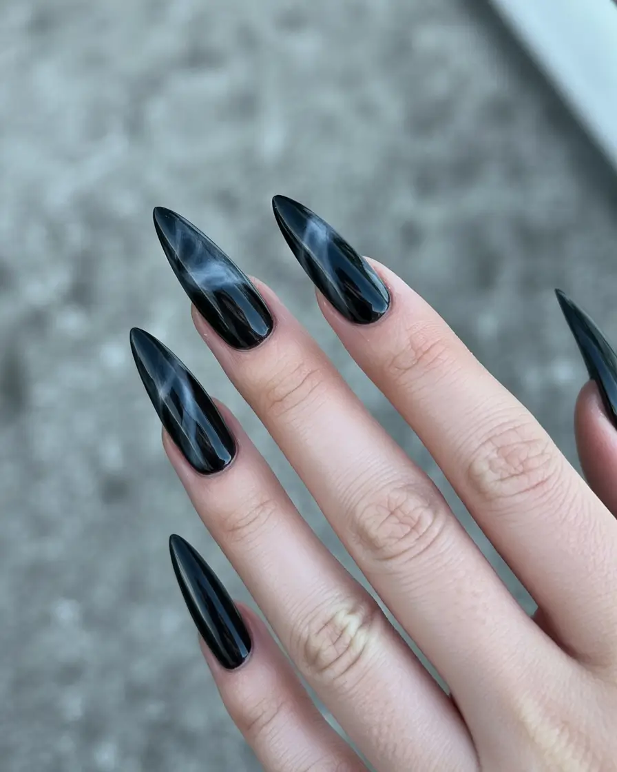 Trendy Black Fall Nails 2025 Glossy Marble Stiletto