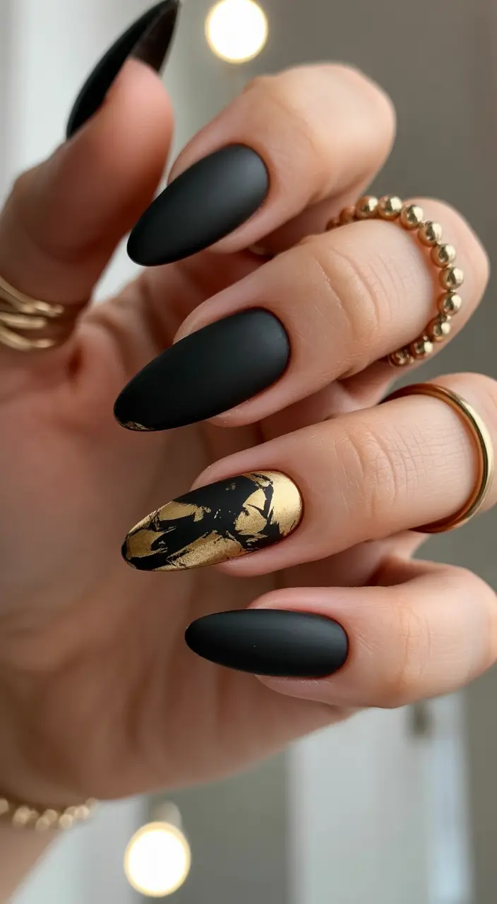 Trendy Black Fall Nails 2025 Black and Gold Marble Blend