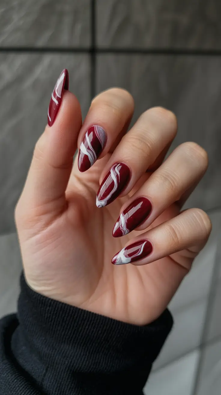 spring nail colors 2026 Cherry Red Waves On Glossy Almond Nails
