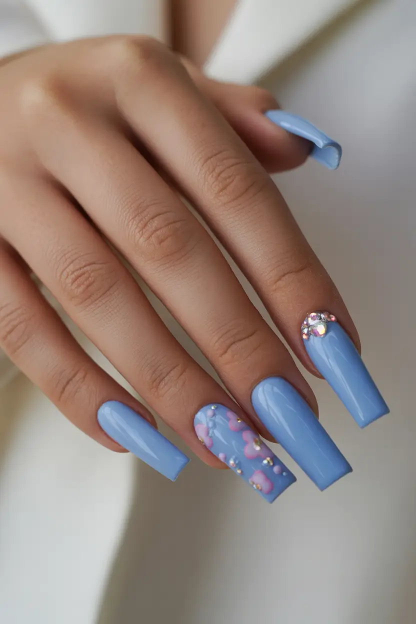 cute cool spring nails 2026 Sky Blue Nails With Floral and Crystal Details