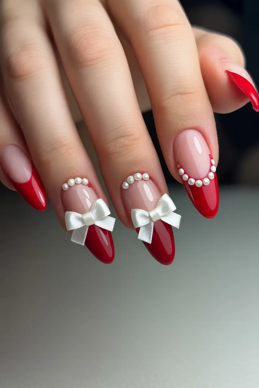 cute cool spring nails 2026 Glossy Red Almond with Pearls and Satin Bows