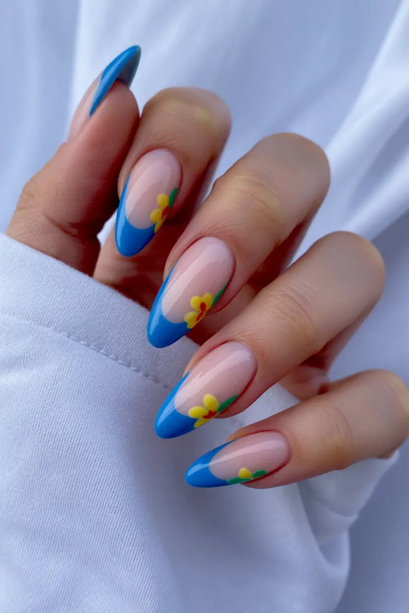 cute spring break nails 2026 Blue French Tips with Mini Florals