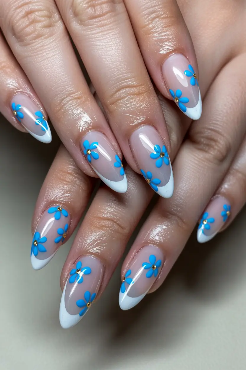 cute spring nails 2026 Blue Daisy French Tips with Gold Details