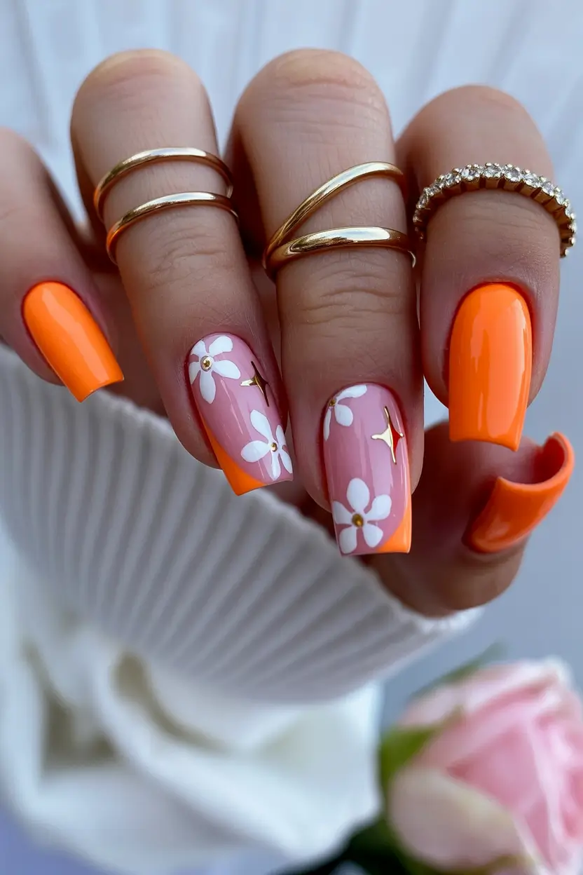 chic spring orange nails 2026 Spring Daisy Nail Art with Bright Orange Acrylic Color