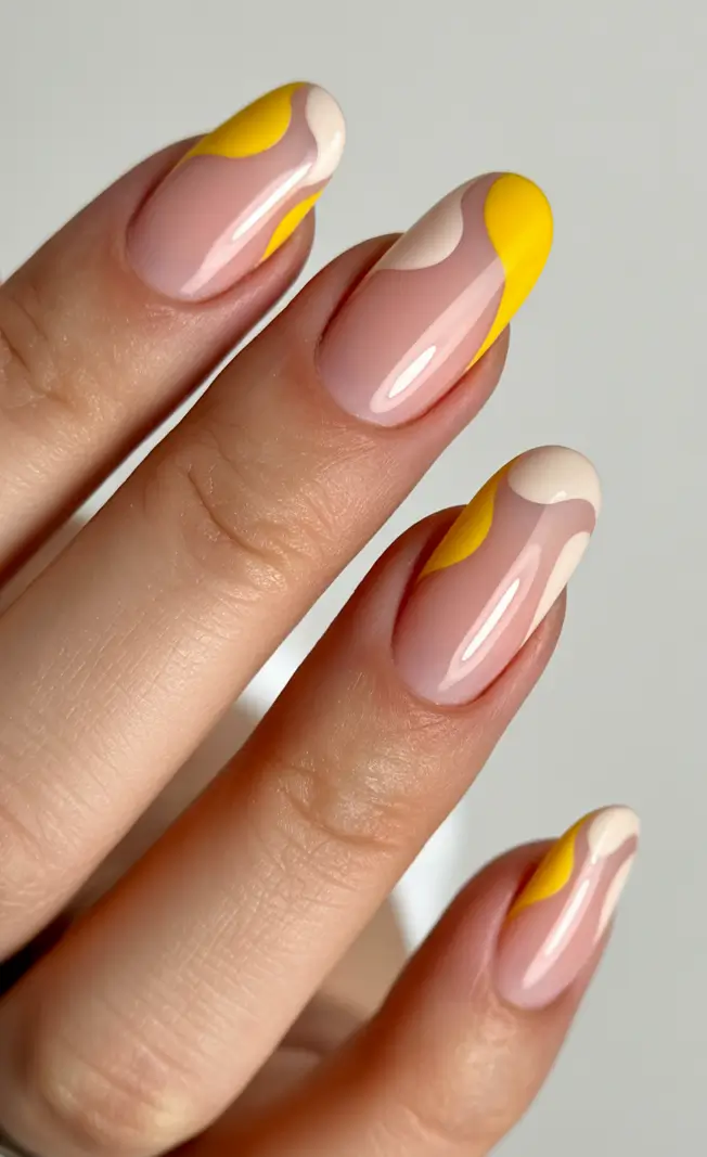 chic spring oval nails 2026 Pastel Yellow and Cream Abstract Waves