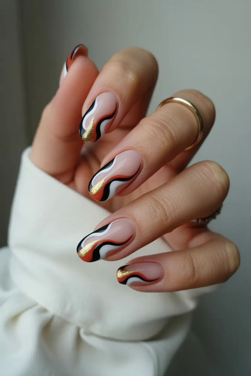chic spring oval nails 2026 Black White and Gold Statement Waves