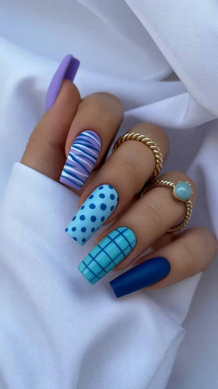 cute easter nail art ideas 2026 Playful Blue Pattern Easter Nails