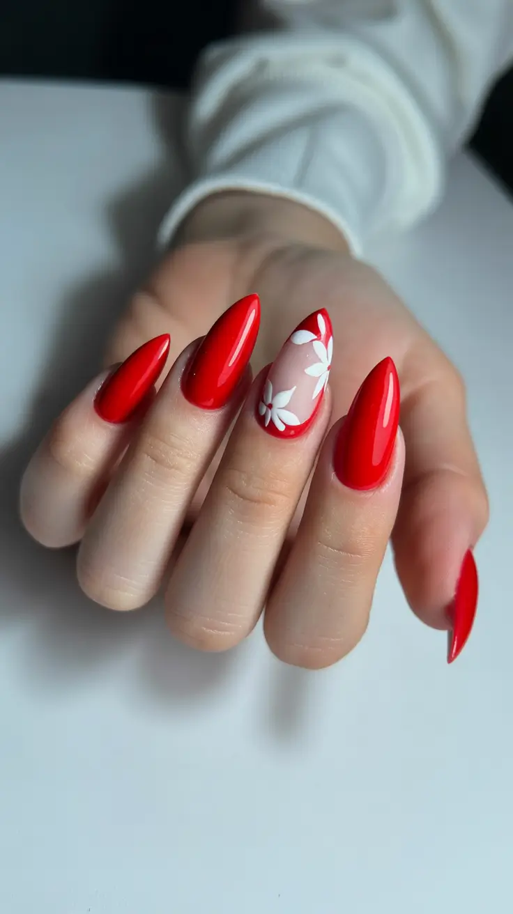 cute red spring nails 2026 cherry red white flower accent