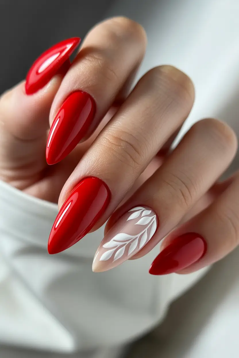 cute red spring nails 2026 Minimal Cherry Red Nails With Delicate White Leaf Art