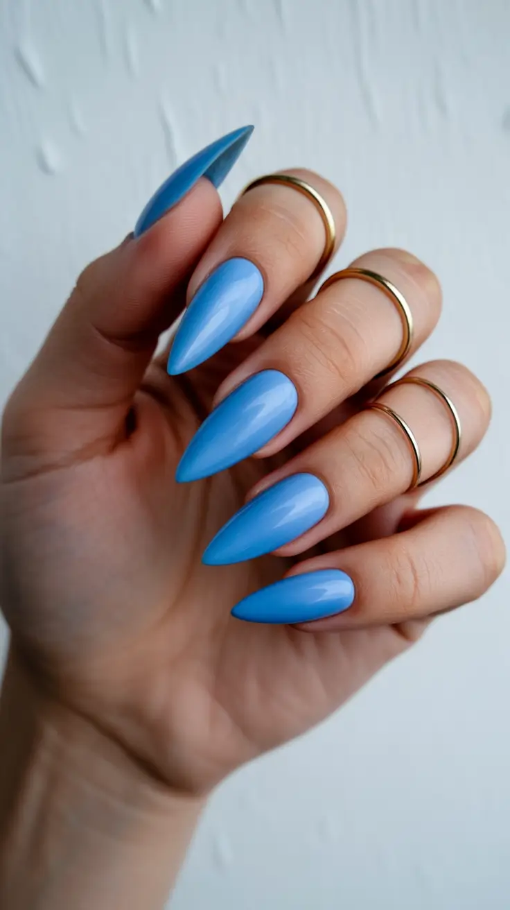 cute spring long nails 2026 sky blue glossy stiletto nails