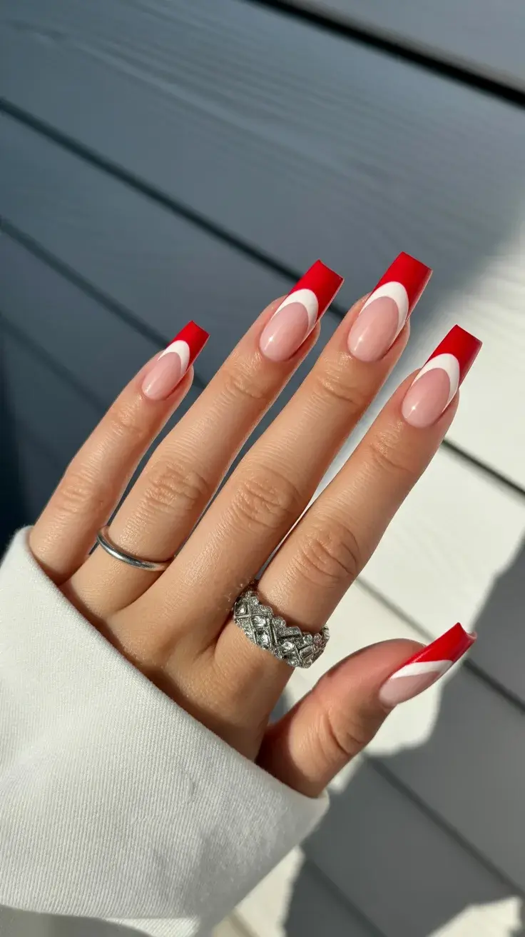 graduation nails ideas 2026 Red French Tip Acrylic Nails for a Statement Graduation Style