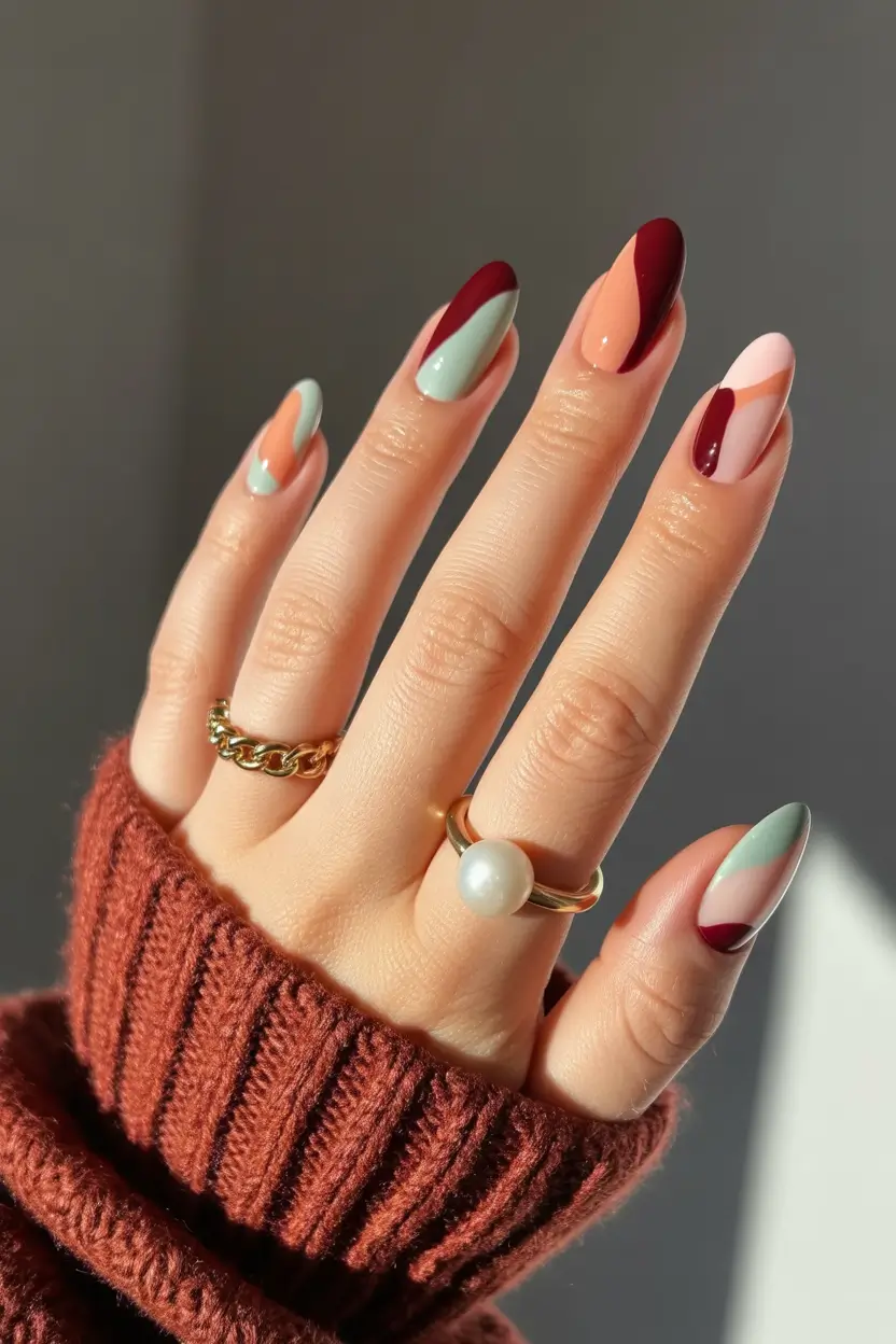 pretty colorful spring nails 2026 Soft Graphic Almond Nails in Spring Neutrals