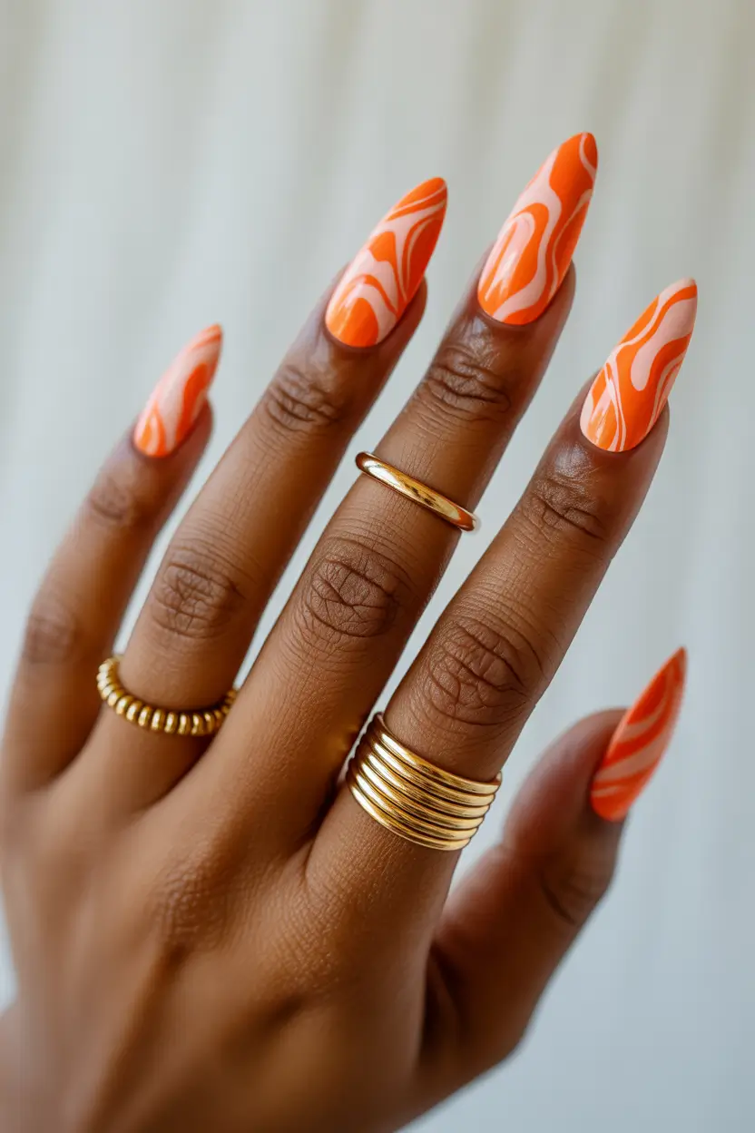 spring nails for dark skin 2026 Vibrant Orange Swirl for Bold Spring Energy