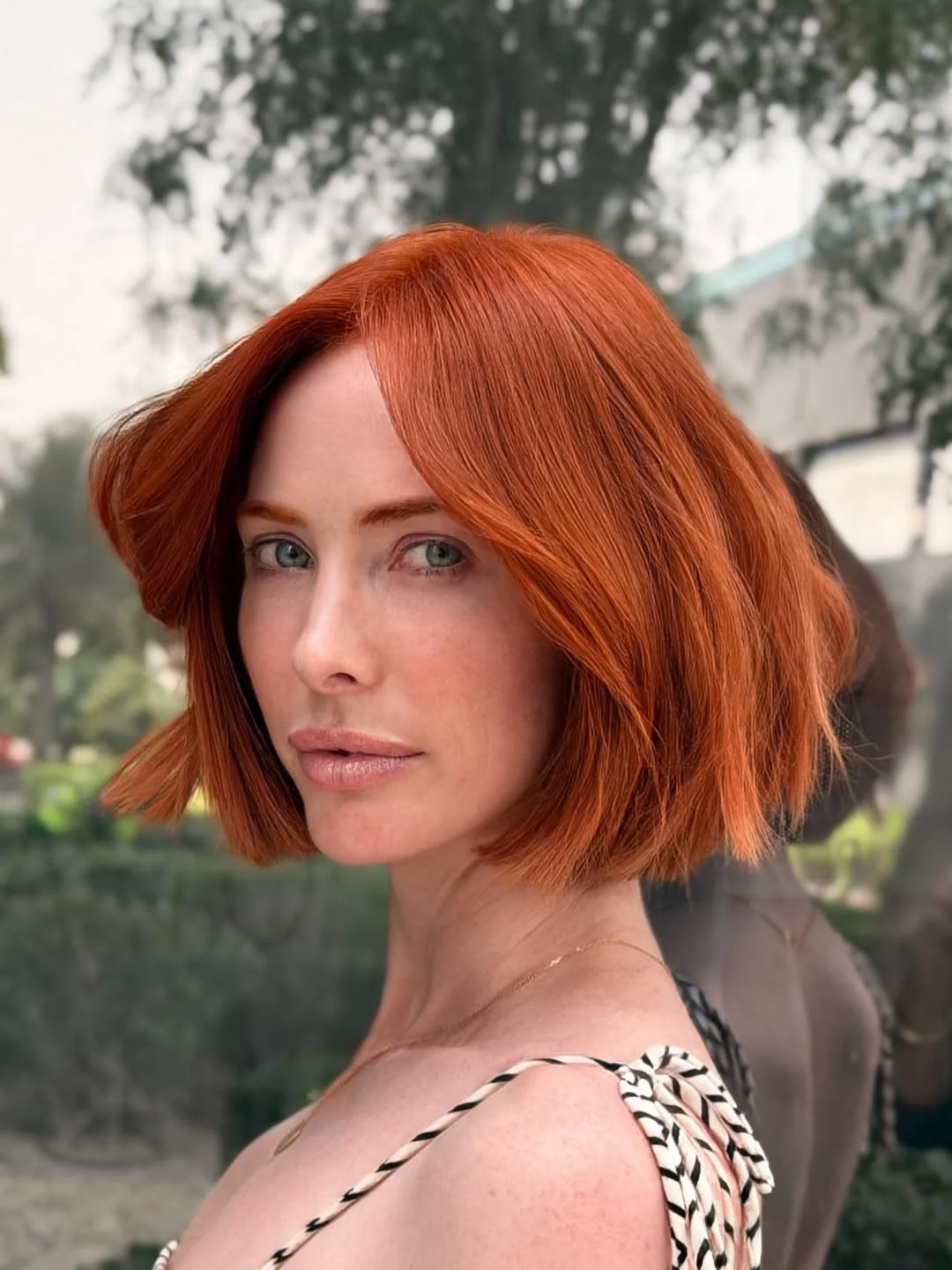 edgy summer short haircuts 2026 Blunt Copper Bob with Soft Movement