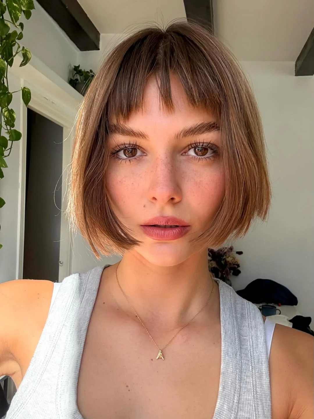 edgy summer short haircuts 2026 Soft Micro Bob with Natural Bangs