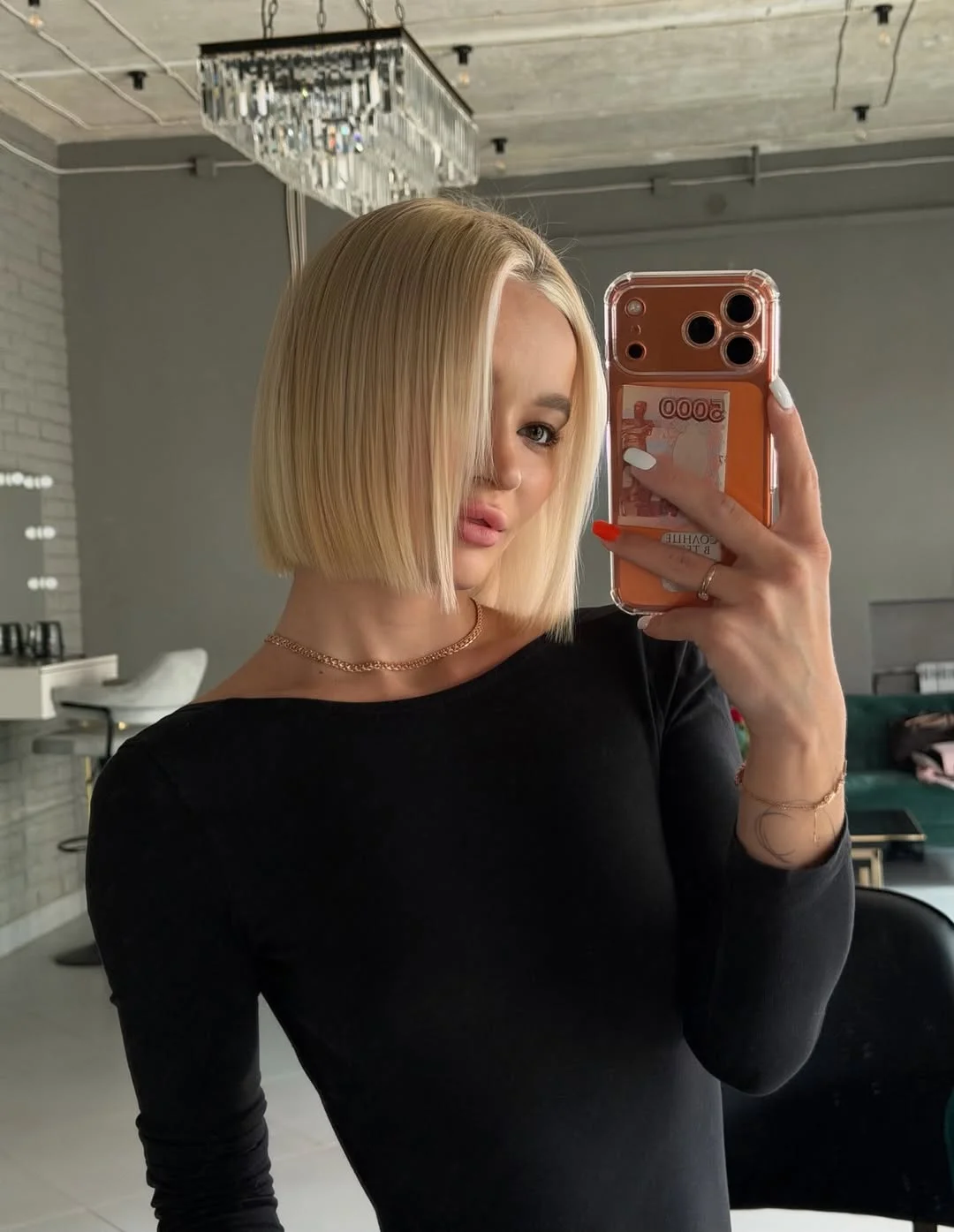 edgy summer short haircuts 2026 Glass Blonde Precision Bob with Center Part