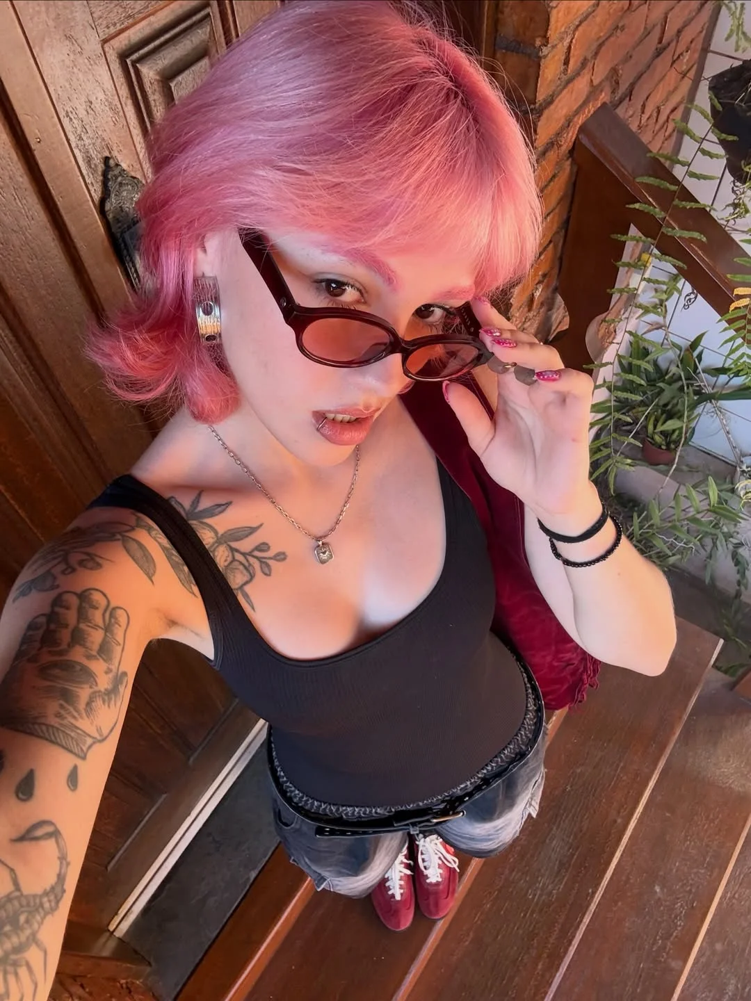 edgy summer short haircuts 2026 Playful Pink Wolf Cut with Soft Bangs