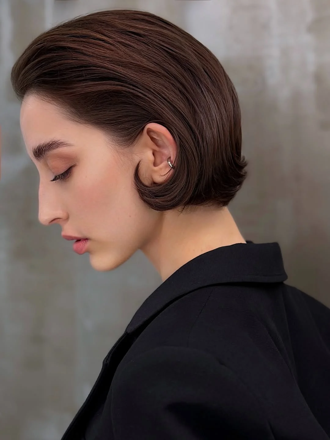 edgy summer short haircuts 2026 Polished Sculpted Bob with Tucked Ends