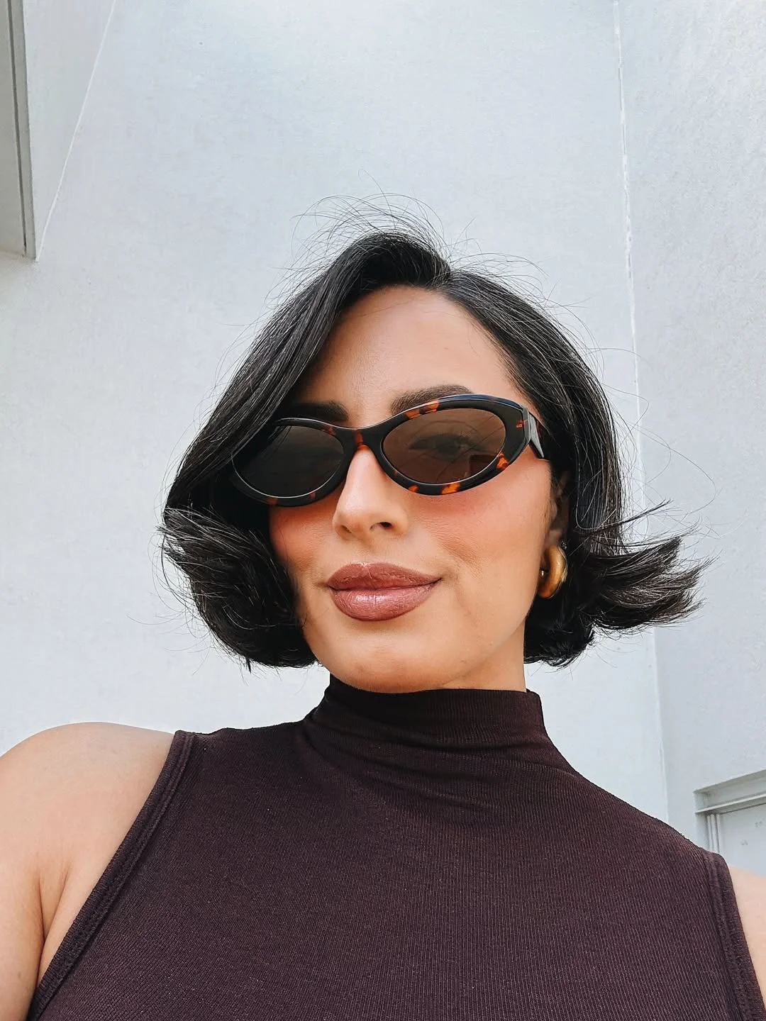 edgy summer short haircuts 2026 Retro Flipped Wavy Bob Revival
