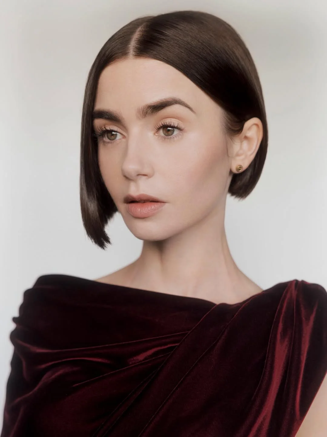 edgy summer short haircuts 2026 Sculpted Glass Bob with a Deep Side Whisper