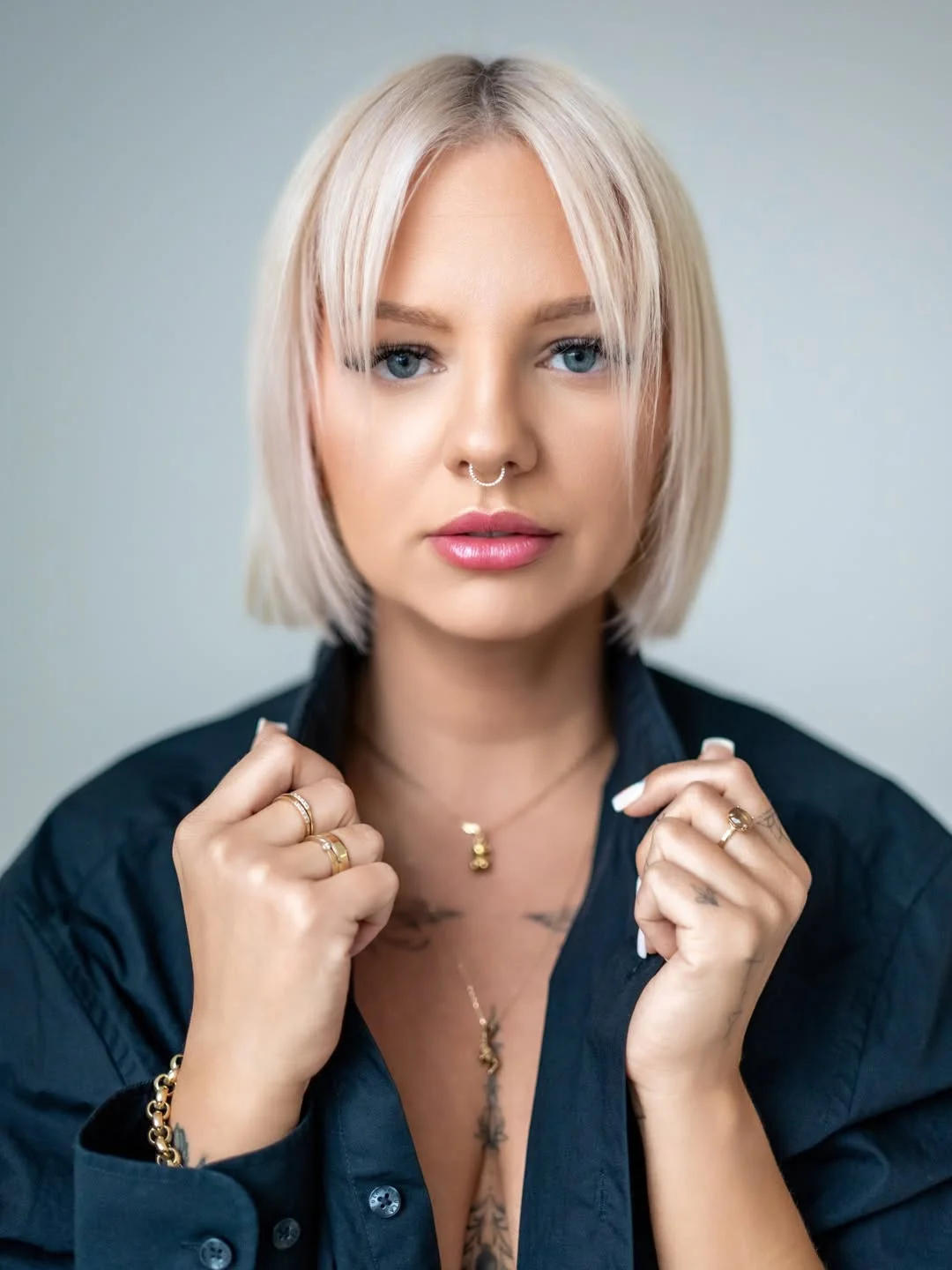 edgy summer short haircuts 2026 Soft Platinum Bob with Airy Fringe Energy