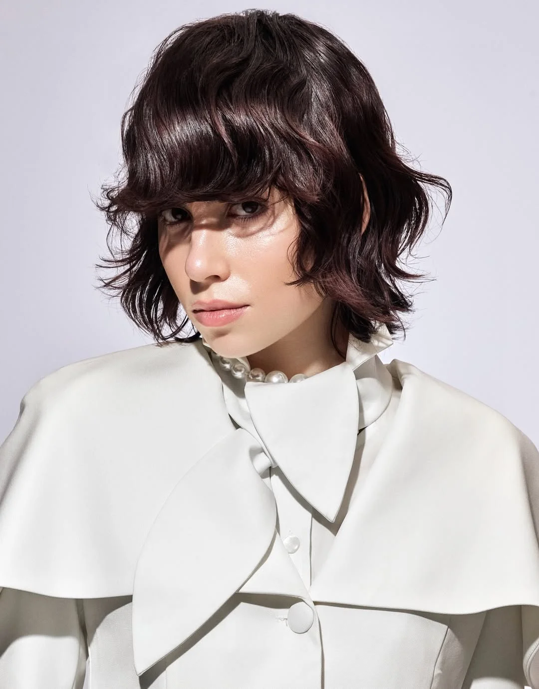 edgy summer short haircuts 2026 Choppy Layered Shag with Modern Wolf Energy