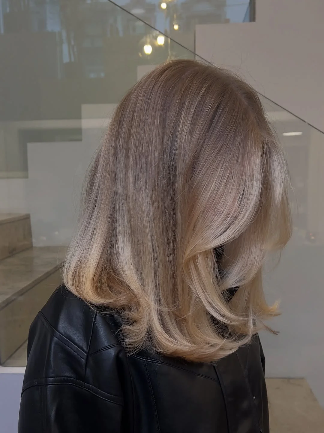 flattering summer haircut for round face 2026 Soft Layered Blonde Lob That Frames Without Trying Too Hard