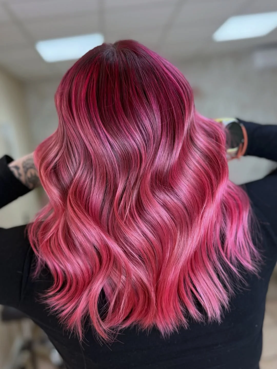 flattering summer haircut for round face 2026 Playful Pink Waves for a Bold Summer Shift