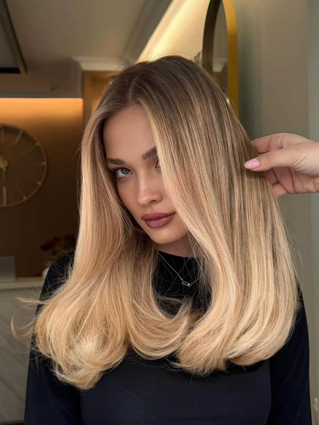 flattering summer haircut for round face 2026 Sleek Long Layers with Polished Volume