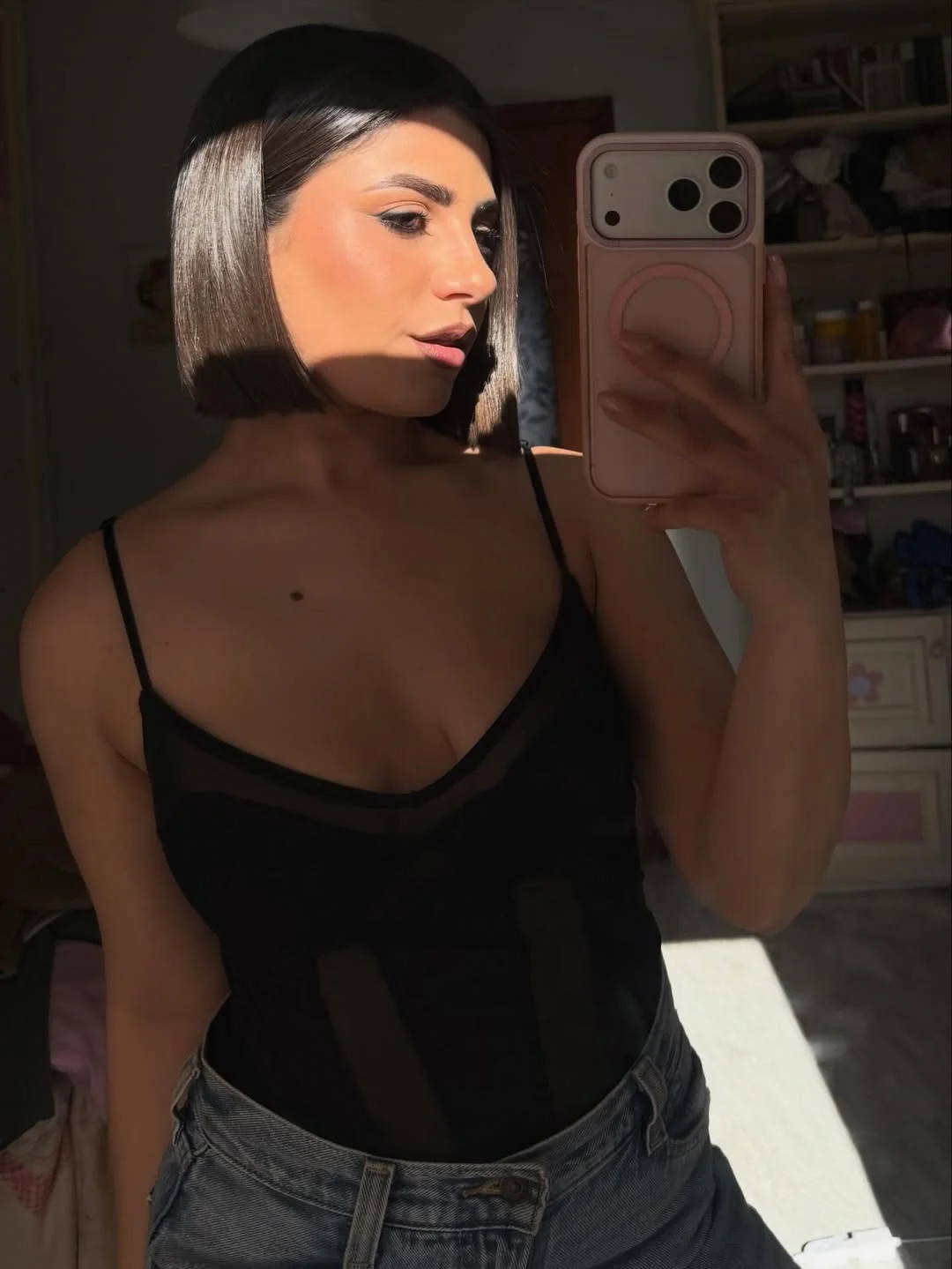 flattering summer haircuts for plus size women 2026 Sharp Glass Short Bob with Deep Shine