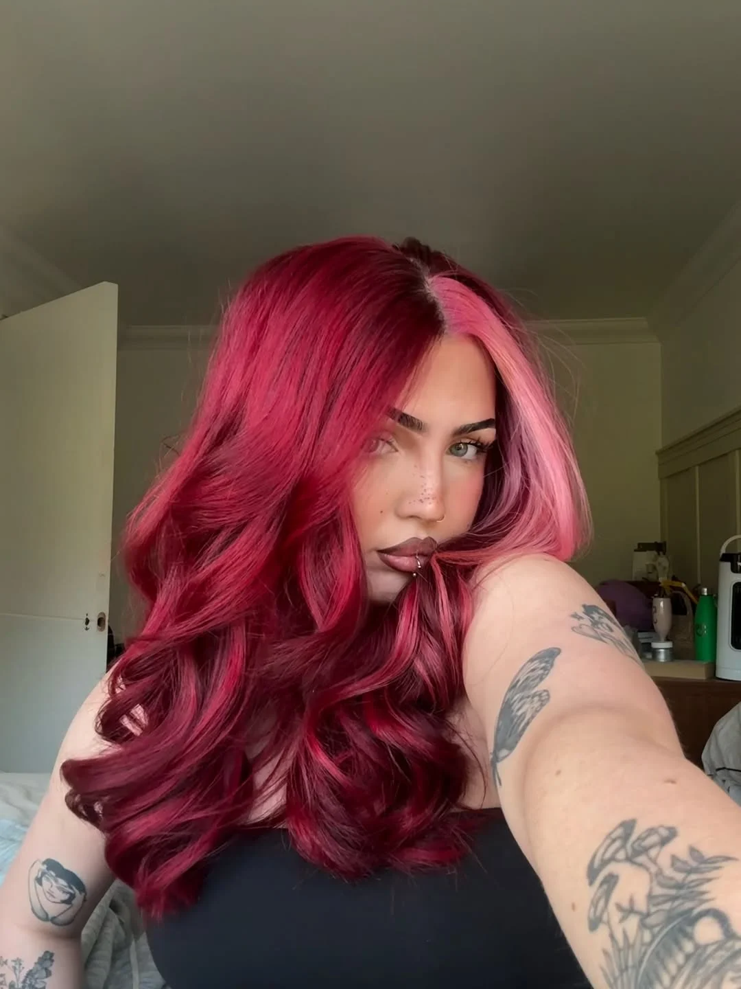 flattering summer haircuts for plus size women 2026 Bold Two Tone Red Waves with Playful Contrast