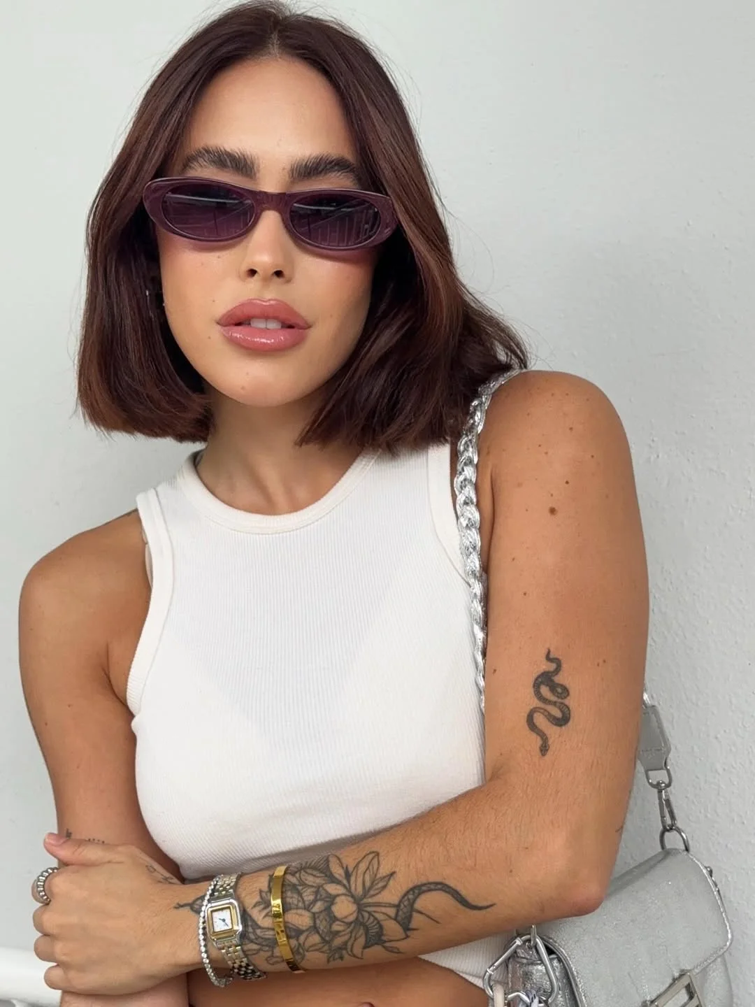 layered summer haircuts for medium hair 2026 Short sleek bob with sharp summer attitude