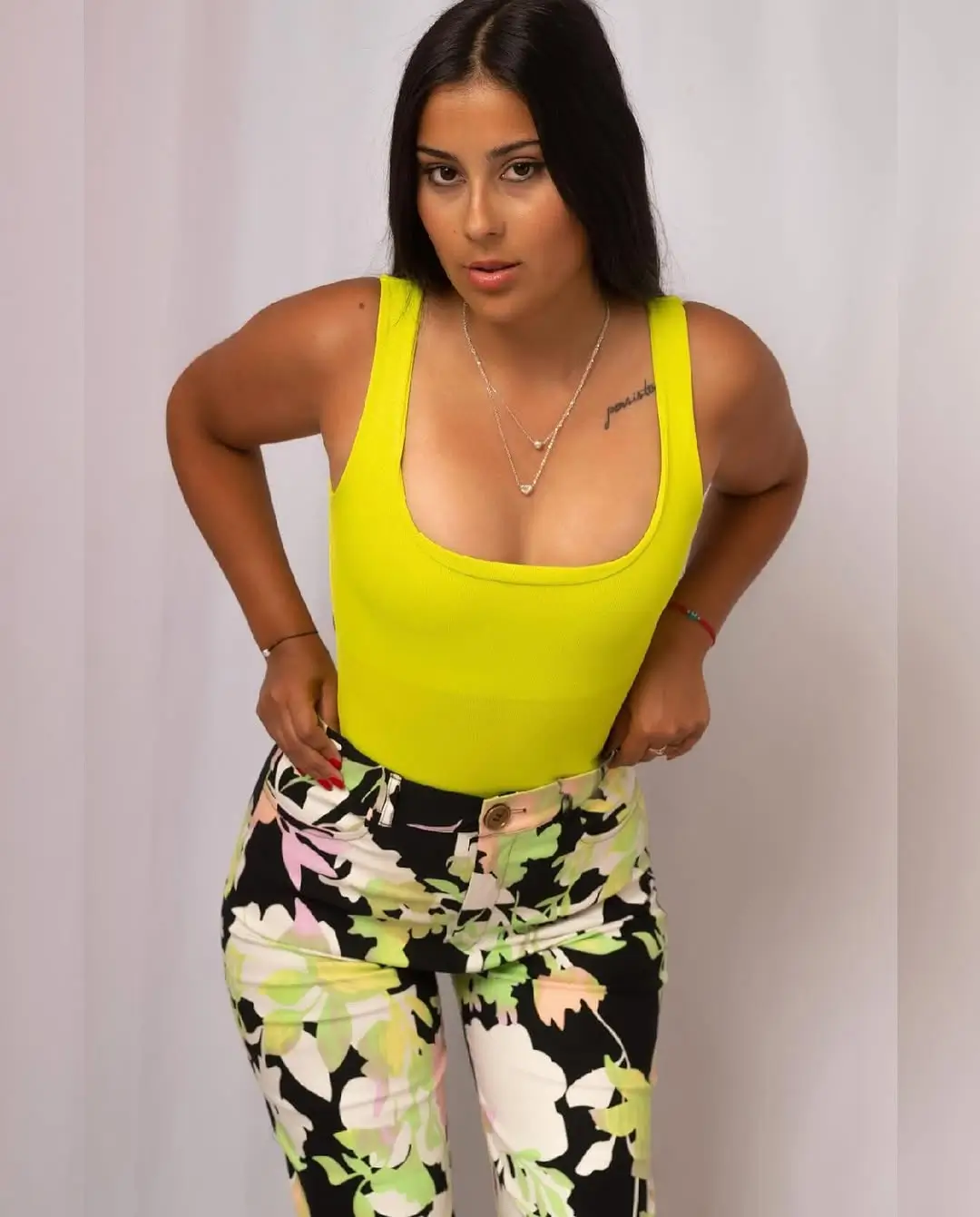 pant outfits summer 2026 Bold Contrast with Floral and Statement Color