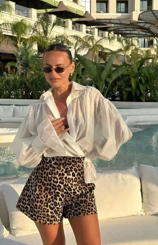 shorts outfit summer 2026 Leopard Shorts and Crisp White Shirts That Feel Bold