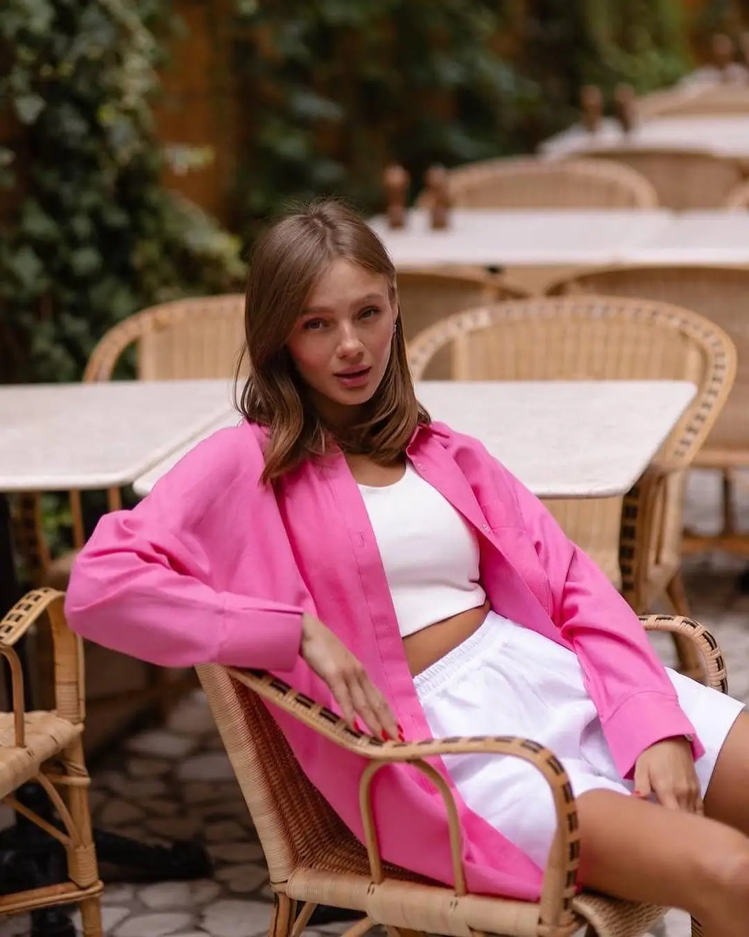 shorts outfit summer 2026 Pink Layers and White Shorts That Feel Effortless