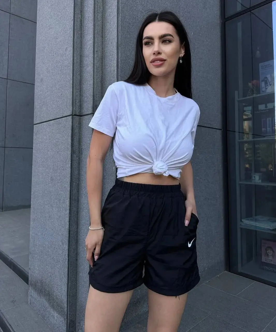 shorts outfit summer 2026 Sporty Black Shorts and Clean White Tops