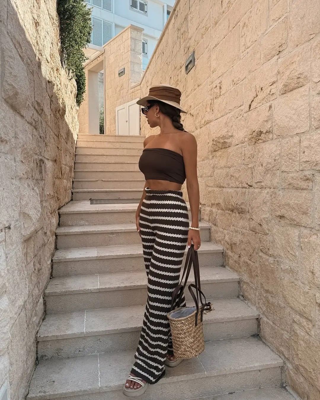 simple casual summer outfits 2026 Striped Pants and Strapless Tops for Bold Summer Days
