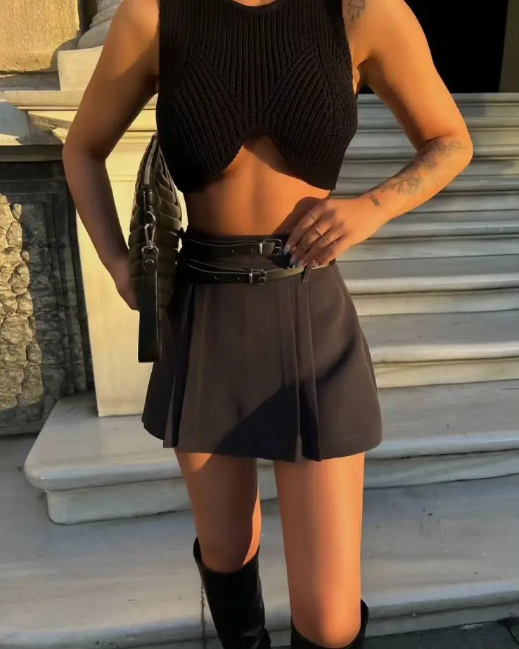 skirt outfits summer 2026 Structured black mini with a confident finish