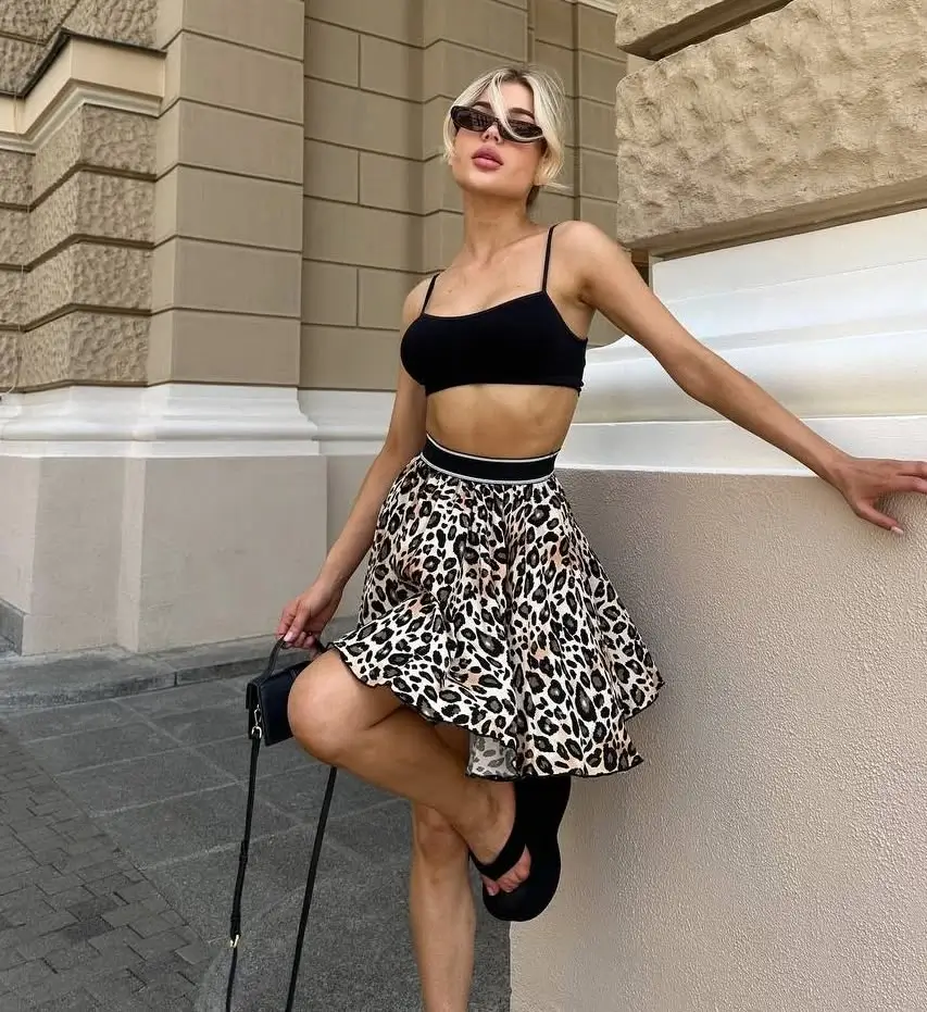 skirt outfits summer 2026 Flirty leopard mini with a sporty mood